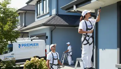 Professional gutter painting on Charlotte NC home exterior by expert house painters
